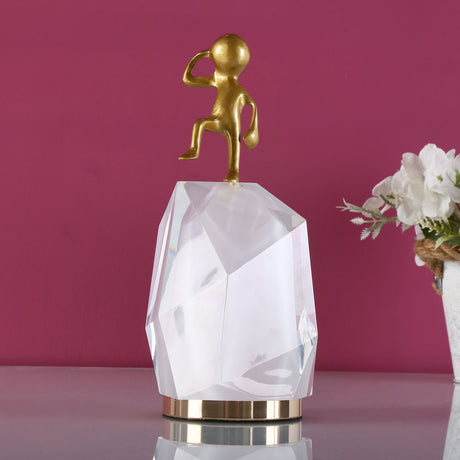 Nilkamal Man Standing On Rock Acrylic Metal Showpiece Gold