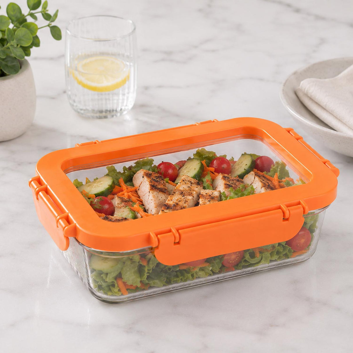 Multipurpose Airtight 1000 ml Food Container- Transparent & Orange