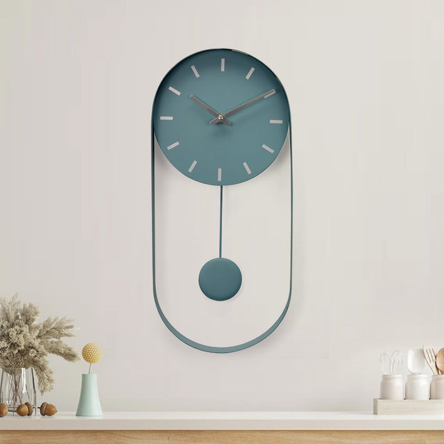 Nilkamal Oval Metal Pendulam Wall Clock Aqua Blue