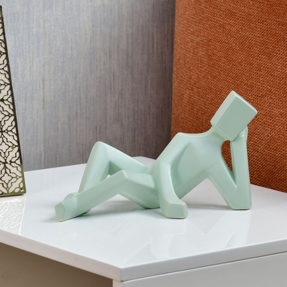 Nilkamal Man Laying Down Dolomite Showpiece Green