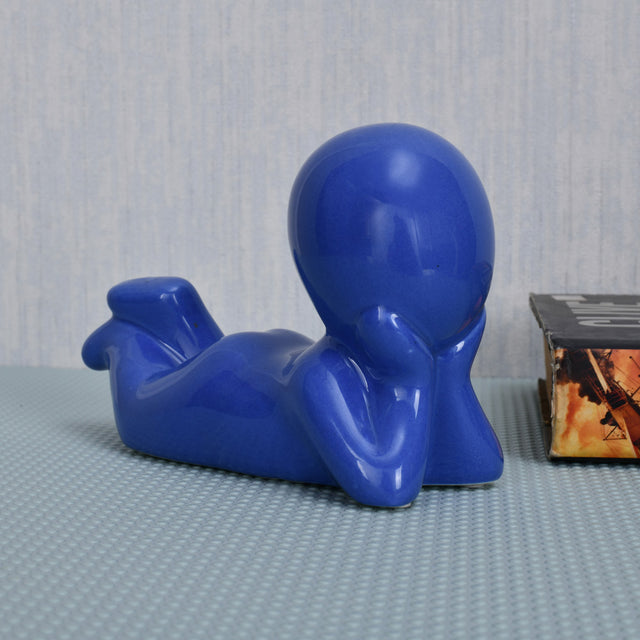 Nilkamal Boy Resting Polyresin Decorative Showpiece (Blue)