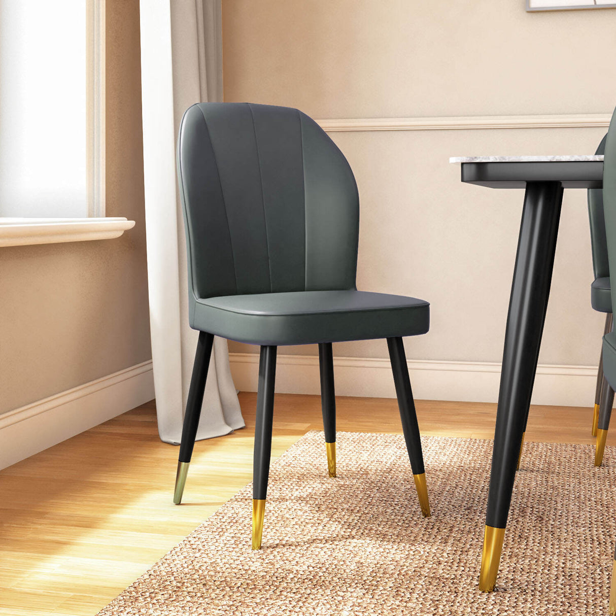 Rexton Grey dining chair with gold-tipped black legs 2