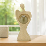 Abstract Human Holding Crystal Sphere Small Polyresin Showpiece- Sand Brown