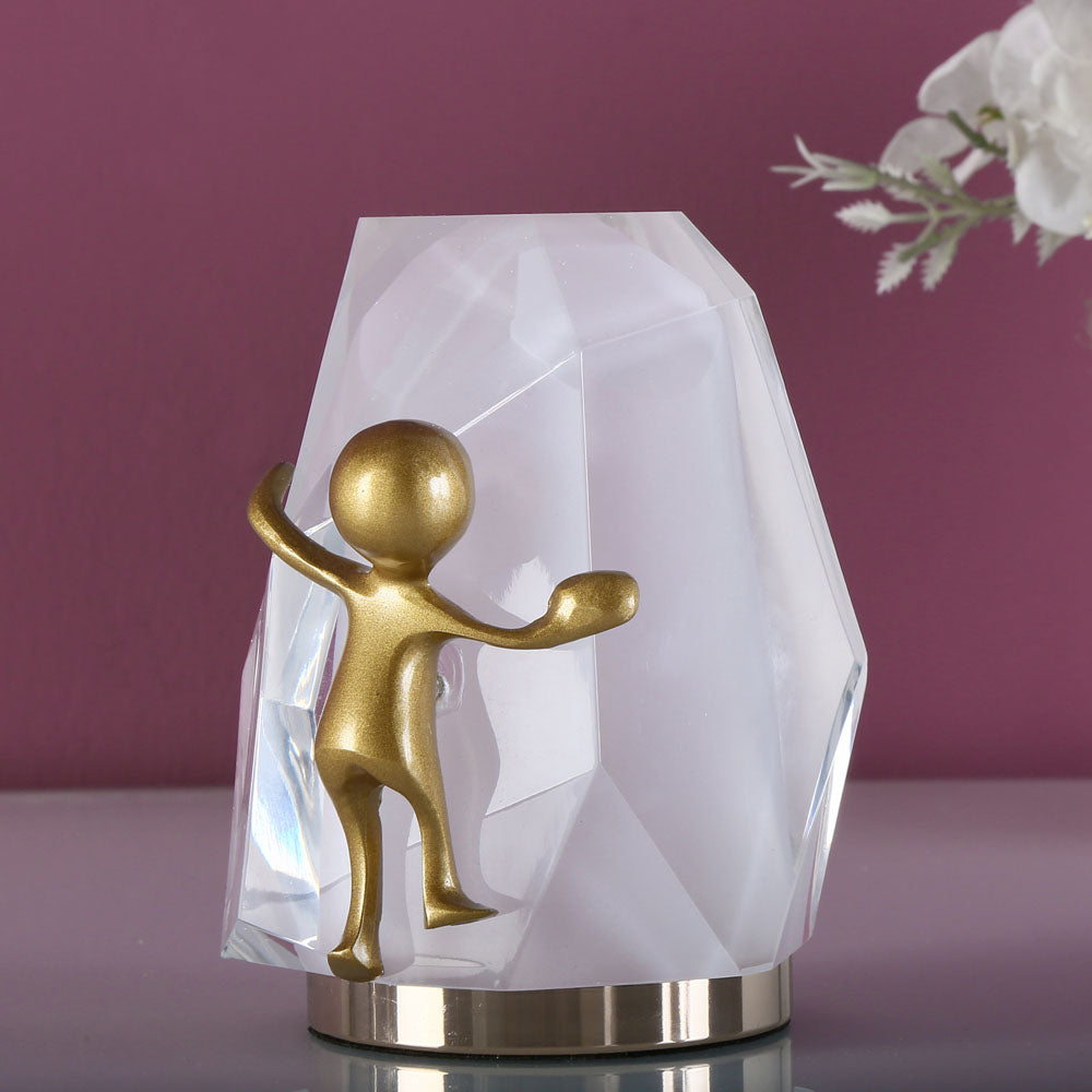 Man Climbing On Rock Acrylic & Metal Showpiece (Gold)