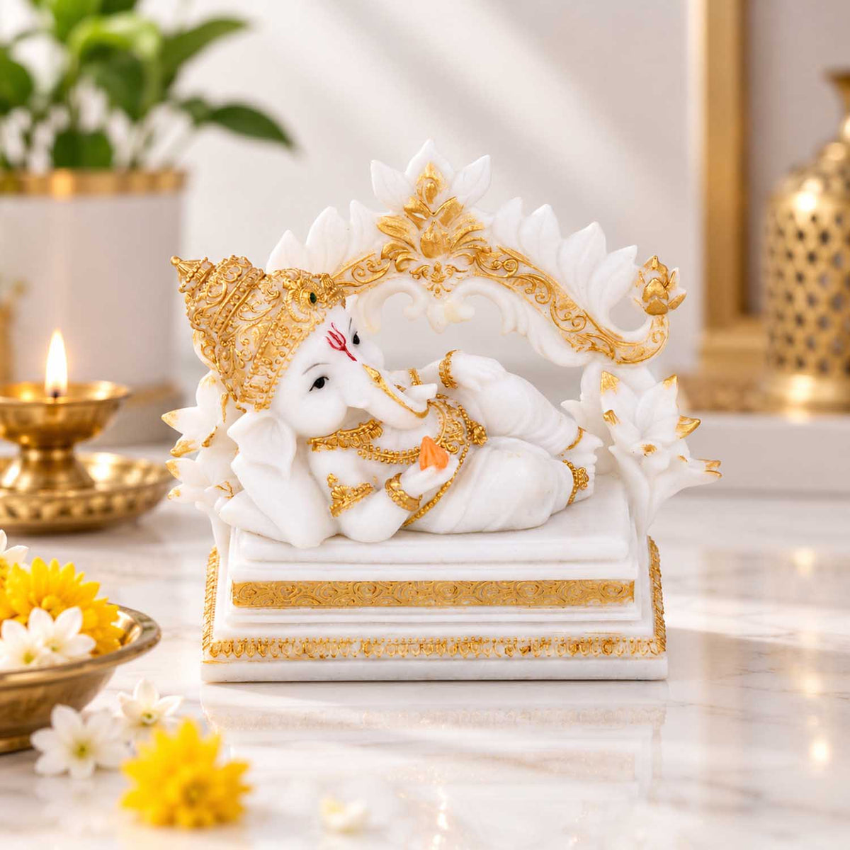 Vandanam Decorative Resting Ganesha with Modak Showpiece- White & Gold
