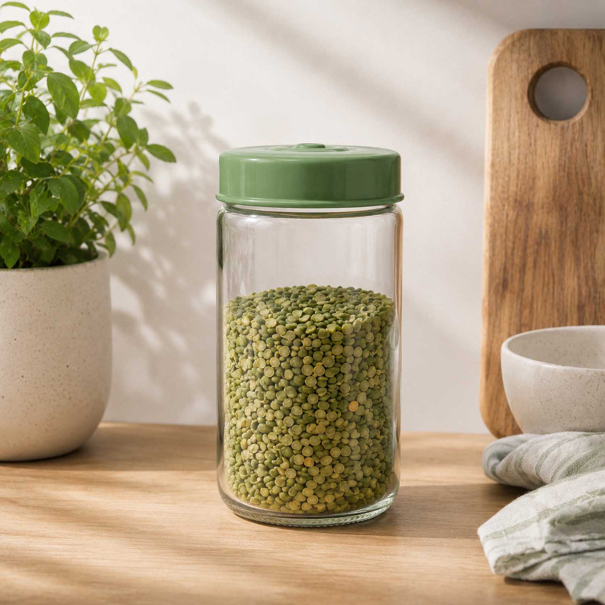 Multipurpose 660 ml Glass Cannister with Lid- Transparent & Green