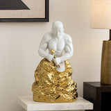 Man Carving Stone Ceramic Showpiece- White & Gold