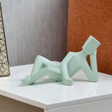 Nilkamal Man Laying Down Dolomite Showpiece Green