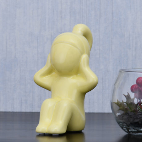 Nilkamal Girl Hear No Evil Polyresin Decorative Showpiece (Yellow)